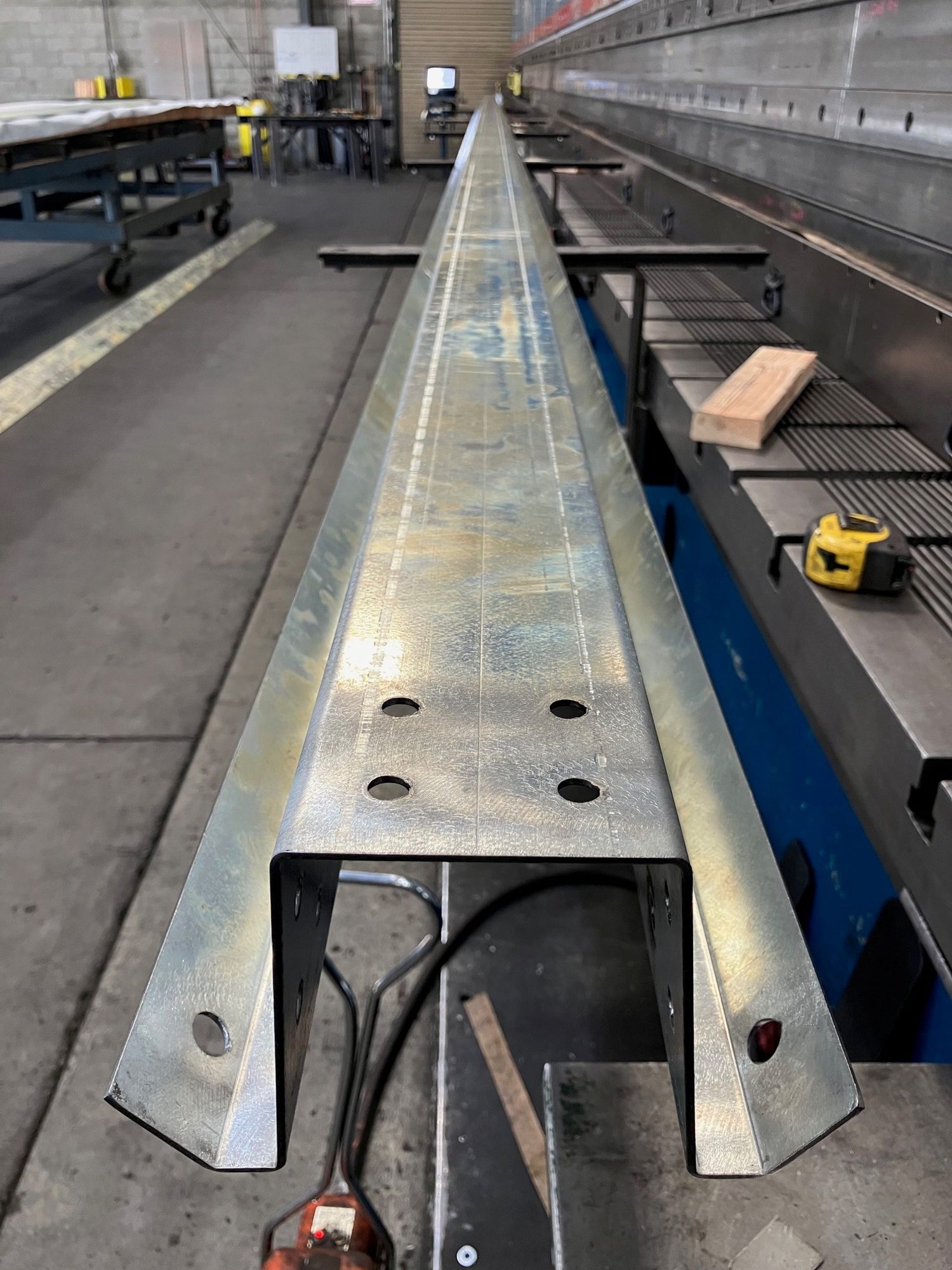 Long length press brake forming